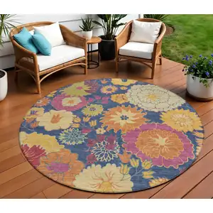 Photo of 8' Navy Blue Gold And Pink Round Floral Washable Indoor Outdoor Area Rug