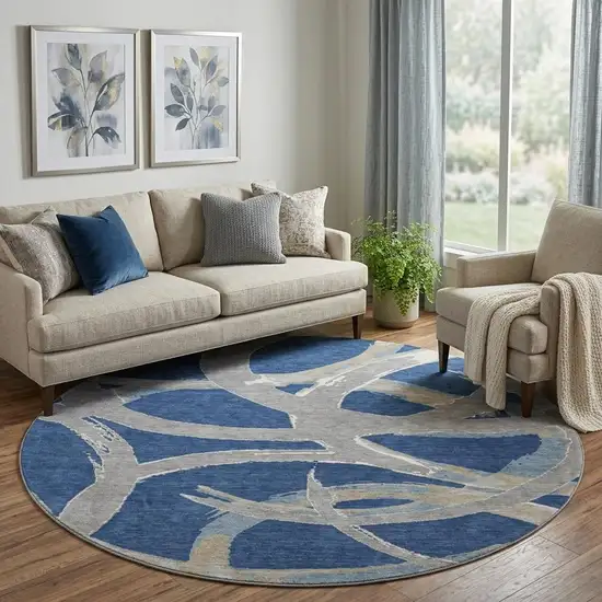 8' Navy Blue Gray And Ivory Abstract Washable Round Rug With UV Protection Photo 1
