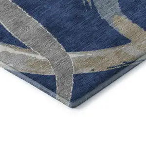 Photo of 8' Navy Blue Gray And Ivory Abstract Washable Round Rug With UV Protection