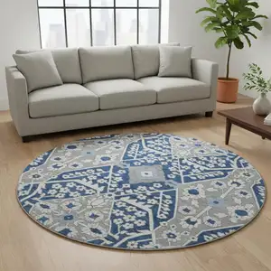 Photo of 8' Navy Blue Gray And Ivory Floral Washable Round Rug With UV Protection