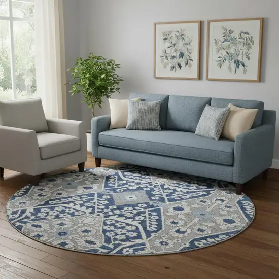 8' Navy Blue Gray And Ivory Floral Washable Round Rug With UV Protection Photo 1