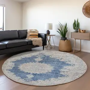 Photo of 8' Navy Blue Gray And Ivory Oriental Washable Round Rug With UV Protection