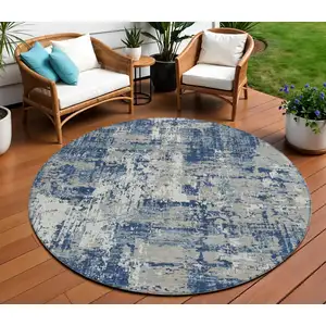 Photo of 8' Navy Blue Gray And Ivory Round Abstract Washable Indoor Outdoor Area Rug