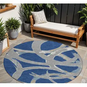 Photo of 8' Navy Blue Gray And Ivory Round Abstract Washable Indoor Outdoor Area Rug