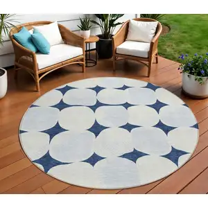 Photo of 8' Navy Blue Gray And Ivory Round Abstract Washable Indoor Outdoor Area Rug