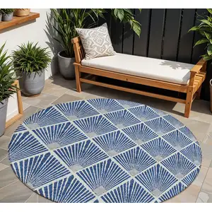 Photo of 8' Navy Blue Gray And Ivory Round Geometric Washable Indoor Outdoor Area Rug