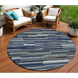 Photo of 8' Navy Blue Gray And Ivory Round Striped Washable Indoor Outdoor Area Rug