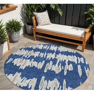 Photo of 8' Navy Blue Gray And Ivory Round Striped Washable Indoor Outdoor Area Rug