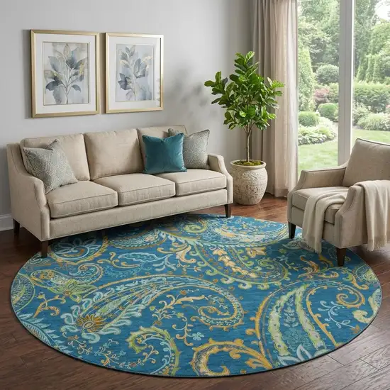 8' Navy Blue Green And Gold Paisley Distressed Washable Round Rug With UV Protection Photo 1