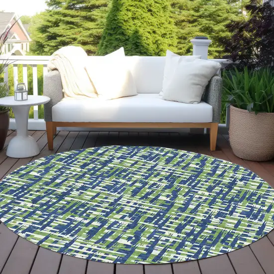 8' Navy Blue Green And Ivory Round Abstract Washable Indoor Outdoor Area Rug Photo 7