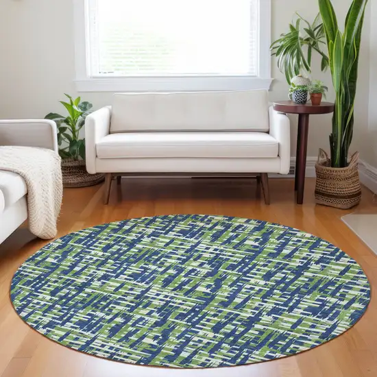 8' Navy Blue Green And Ivory Round Abstract Washable Indoor Outdoor Area Rug Photo 8