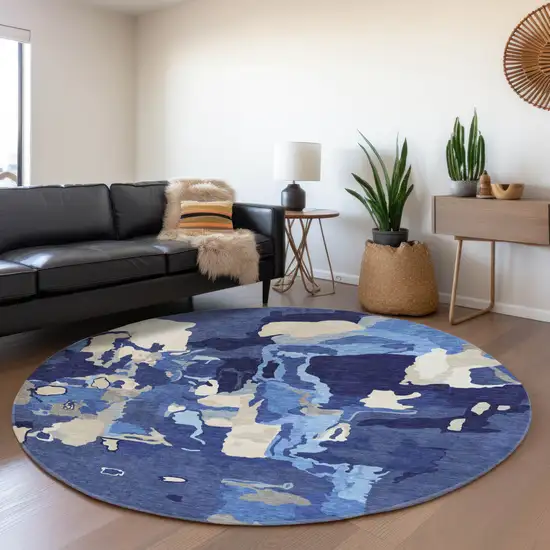 8' Navy Blue Ivory And Beige Abstract Washable Round Rug With UV Protection Photo 4