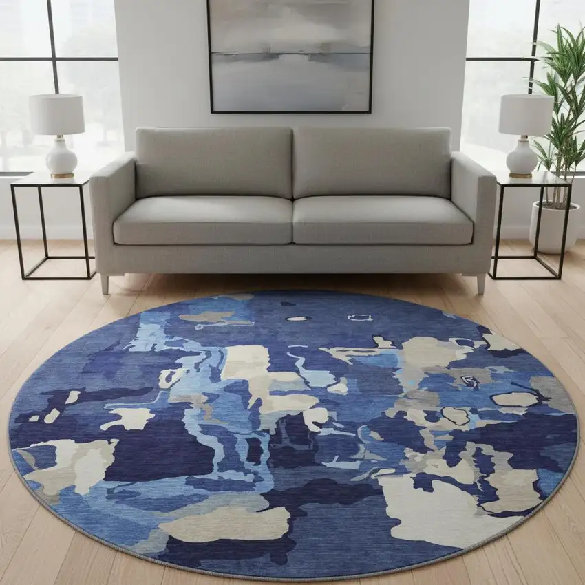 8' Navy Blue Ivory And Beige Abstract Washable Round Rug With UV Protection Photo 2