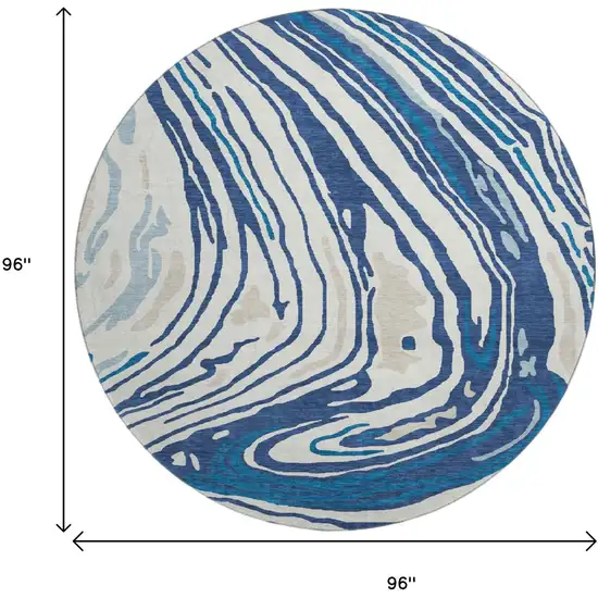 8' Navy Blue Ivory And Beige Abstract Washable Round Rug With UV Protection Photo 8