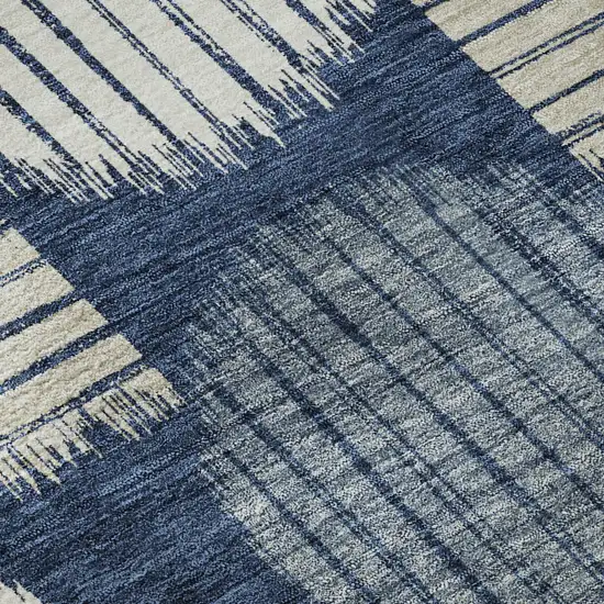 8' Navy Blue Ivory And Beige Geometric Washable Round Rug With UV Protection Photo 9