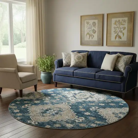 8' Navy Blue Ivory And Beige Medallion Washable Round Rug With UV Protection Photo 1