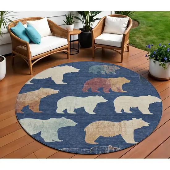 8' Navy Blue Ivory And Beige Round Animal Print Washable Indoor Outdoor Area Rug Photo 1