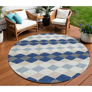 Photo of 8' Navy Blue Ivory And Beige Round Geometric Washable Indoor Outdoor Area Rug