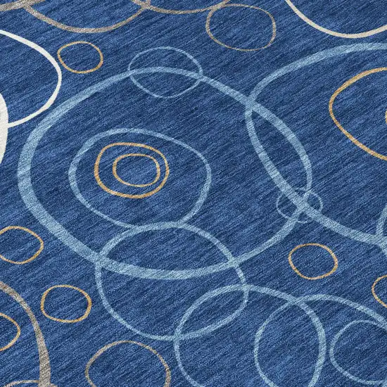 8' Navy Blue Ivory And Brown Round Geometric Washable Indoor Outdoor Area Rug Photo 9