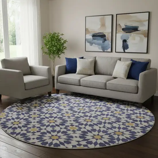 8' Navy Blue Ivory And Gold Geometric Washable Round Rug With UV Protection Photo 1