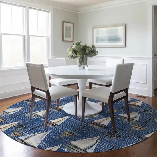 8' Navy Blue Ivory And Gold Nautical Washable Round Rug With UV Protection Photo 6