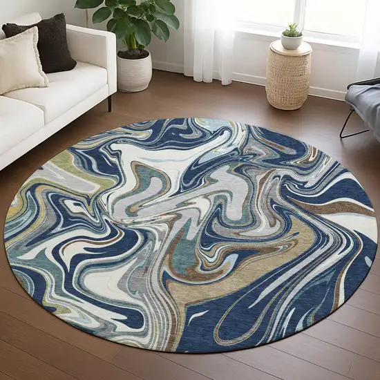 8' Navy Blue Ivory And Gold Round Abstract Washable Indoor Outdoor Area Rug Photo 5