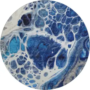 Photo of 8' Navy Blue Ivory And Gray Abstract Washable Round Rug With UV Protection