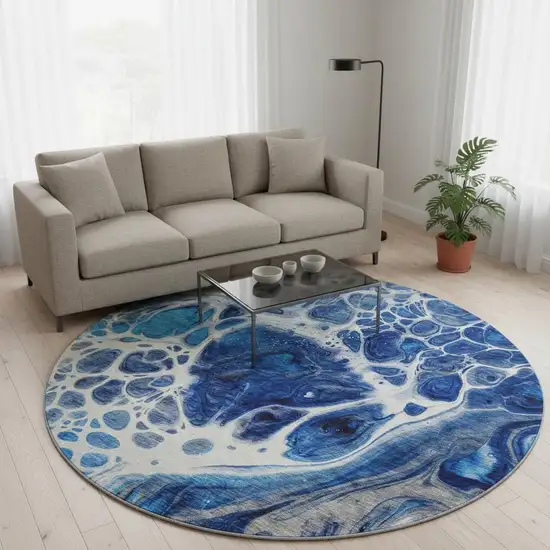 8' Navy Blue Ivory And Gray Abstract Washable Round Rug With UV Protection Photo 2