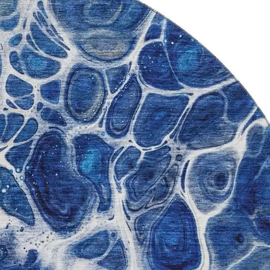 8' Navy Blue Ivory And Gray Abstract Washable Round Rug With UV Protection Photo 3