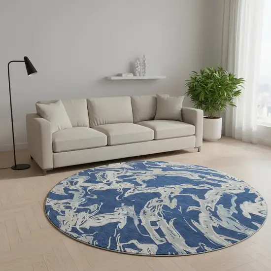 8' Navy Blue Ivory And Gray Abstract Washable Round Rug With UV Protection Photo 2