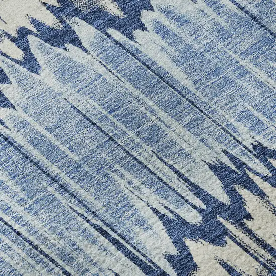 8' Navy Blue Ivory And Gray Striped Washable Round Rug With UV Protection Photo 9