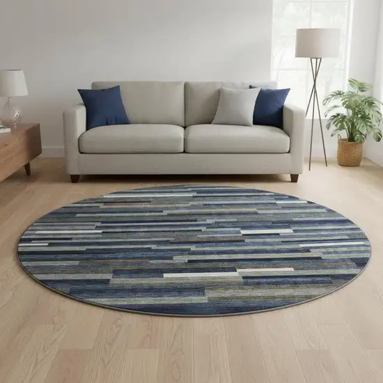 8' Navy Blue Ivory And Gray Striped Washable Round Rug With UV Protection Photo 2
