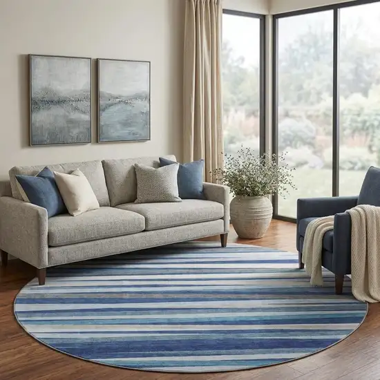 8' Navy Blue Ivory And Gray Striped Washable Round Rug With UV Protection Photo 1