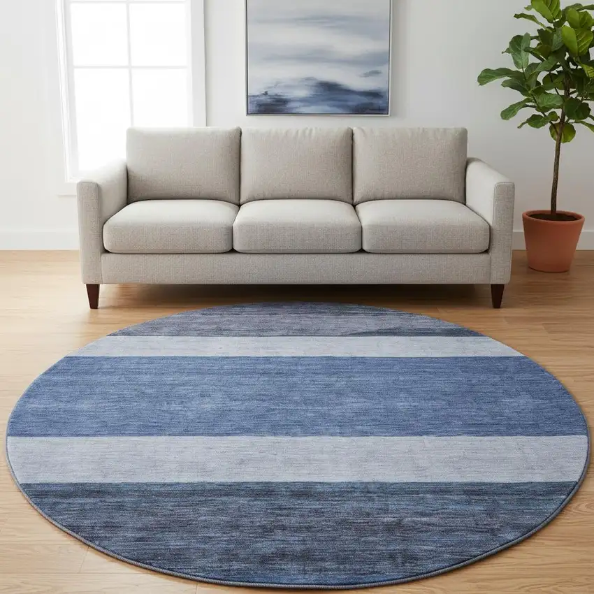 8' Navy Blue Ivory And Gray Striped Washable Round Rug With UV Protection Photo 2