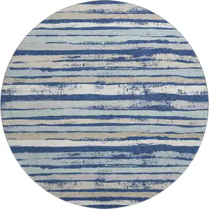 Photo of 8' Navy Blue Ivory And Taupe Striped Washable Round Rug With UV Protection