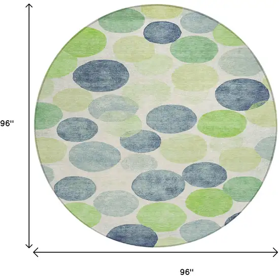 8' Navy Blue Lime Green And Ivory Round Geometric Washable Indoor Outdoor Area Rug Photo 8