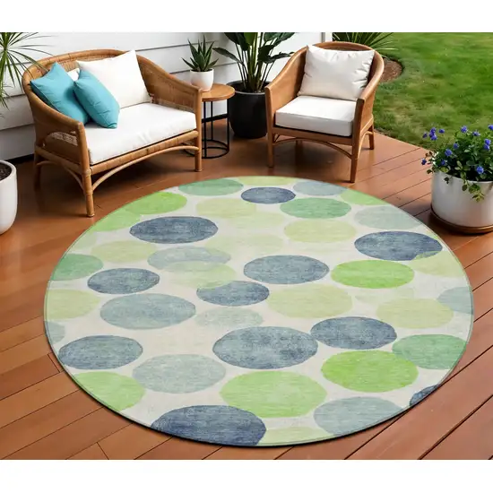 8' Navy Blue Lime Green And Ivory Round Geometric Washable Indoor Outdoor Area Rug Photo 2