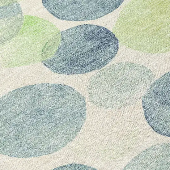 8' Navy Blue Lime Green And Ivory Round Geometric Washable Indoor Outdoor Area Rug Photo 9