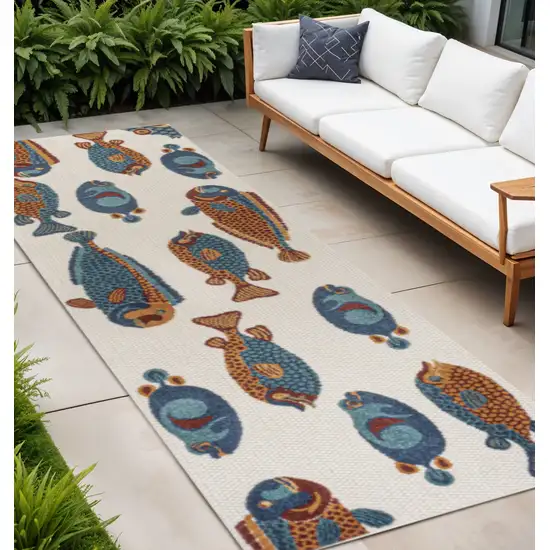 8' Navy Blue Orange And Cream Animal Print Indoor Outdoor Runner Rug Photo 1