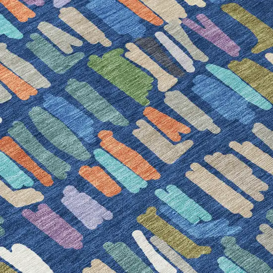 8' Navy Blue Orange And Green Round Striped Washable Indoor Outdoor Area Rug Photo 9