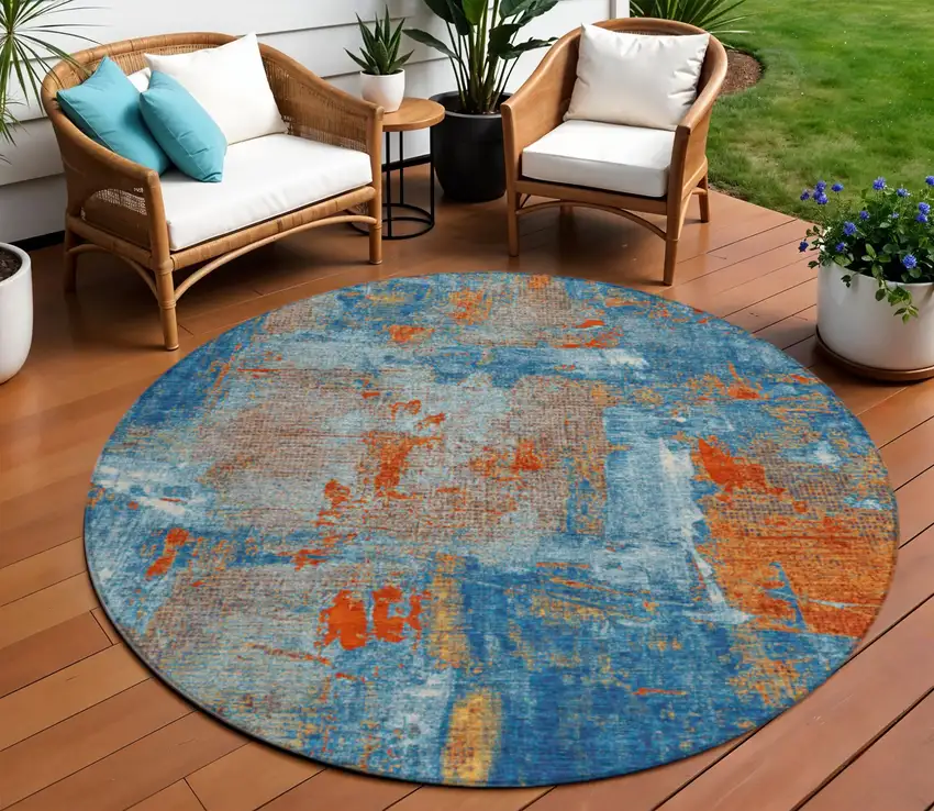 8' Navy Blue Orange And Ivory Round Abstract Washable Indoor Outdoor Area Rug Photo 1