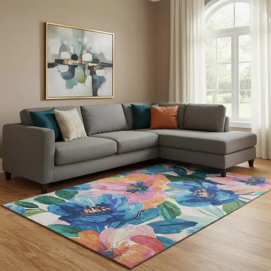 8' Navy Blue Orange And Pink Floral Washable Area Rug With UV Protection Photo 2