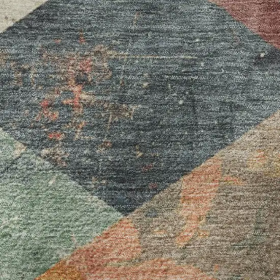 8' Navy Blue Orange And Red Geometric Washable Round Rug With UV Protection Photo 9