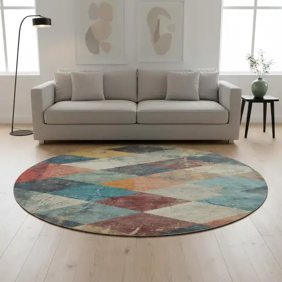 8' Navy Blue Orange And Red Geometric Washable Round Rug With UV Protection Photo 2