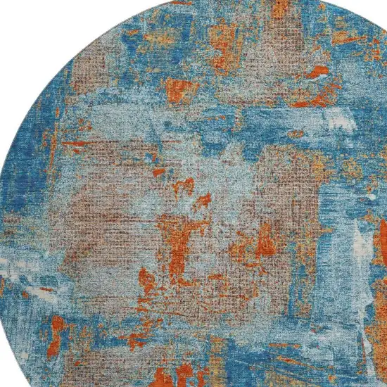 8' Navy Blue Orange And Teal Abstract Washable Round Rug With UV Protection Photo 2