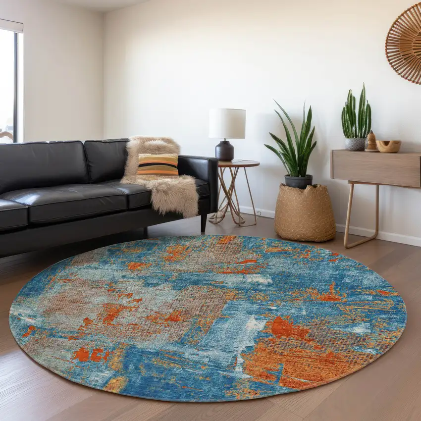 8' Navy Blue Orange And Teal Abstract Washable Round Rug With UV Protection Photo 4