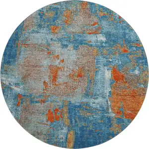 Photo of 8' Navy Blue Orange And Teal Abstract Washable Round Rug With UV Protection