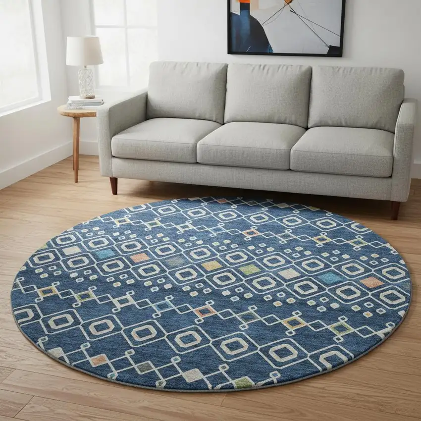 8' Navy Blue Peach And Gold Southwestern Washable Round Rug With UV Protection Photo 2