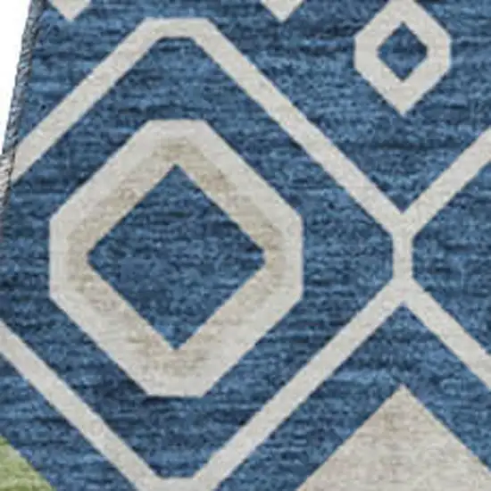 8' Navy Blue Peach And Gold Southwestern Washable Round Rug With UV Protection Photo 3