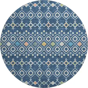 Photo of 8' Navy Blue Peach And Gold Southwestern Washable Round Rug With UV Protection